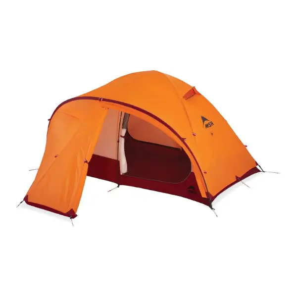 MSR Remote 2 expedition-grade tent in orange and red, designed for extreme winds and snowfall in high-altitude conditions.